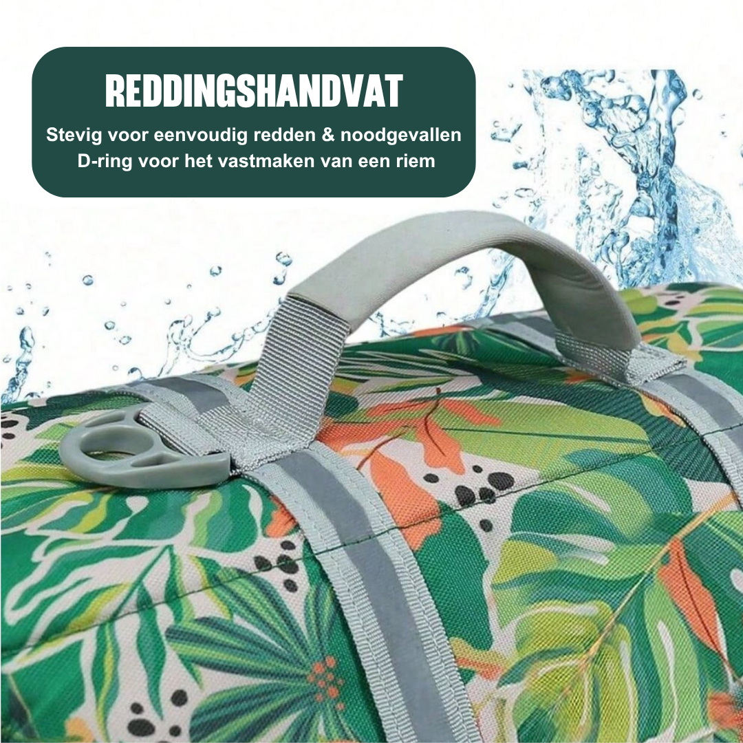 Reddingshandvat aan het hondenzwemvest van Jaap & Co