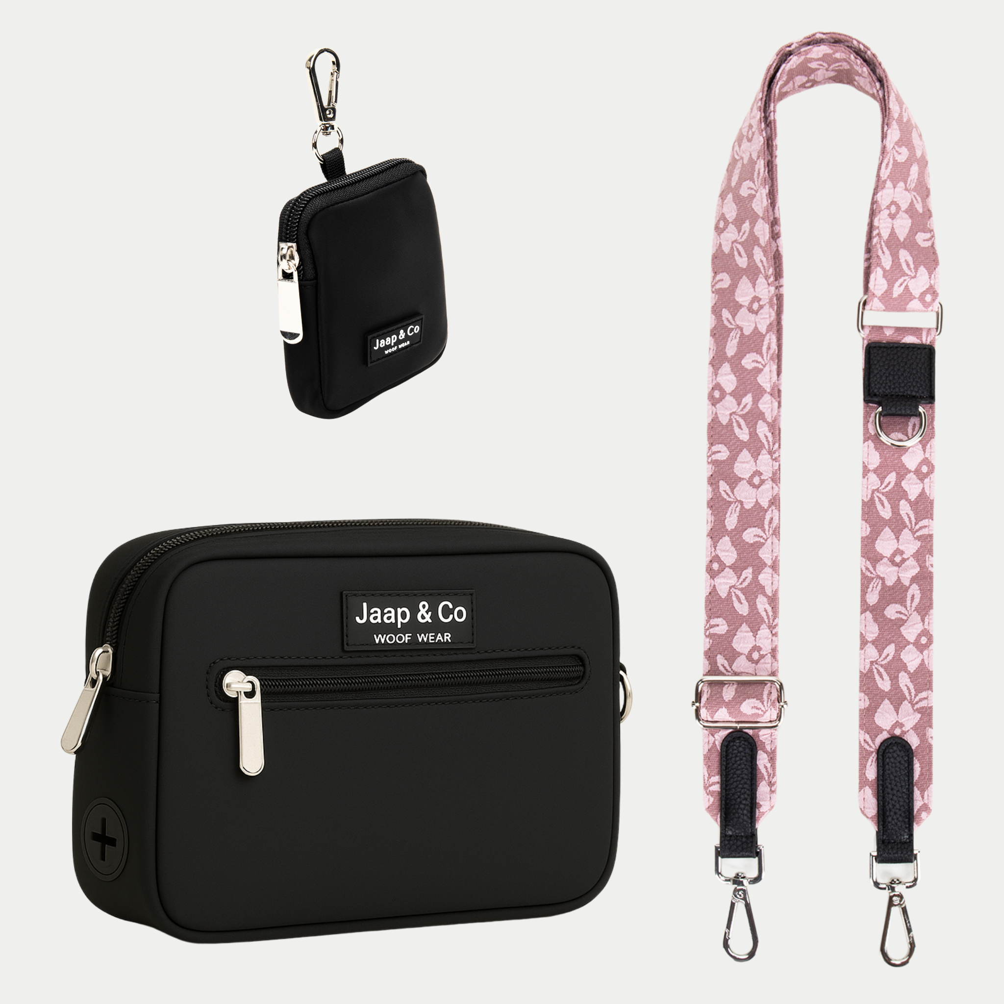 Zwarte Dogmom Bag met een oudroze met lichter roze bloemen schouderband, inclusief treat pouch – set voor stijlvolle hondenwandelingen.