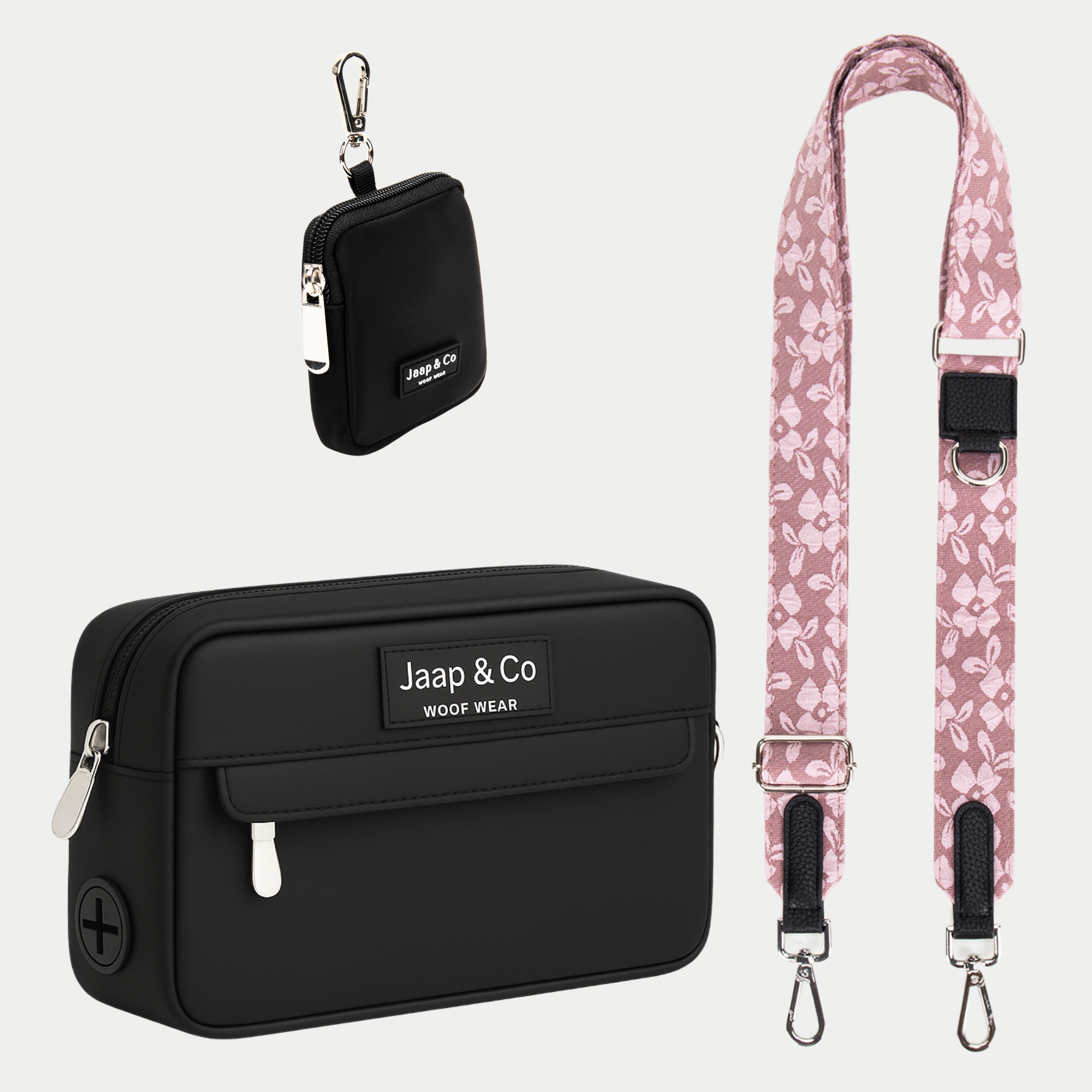 Zwarte Dogmom Bag met een oudroze met lichter roze bloemen schouderband, inclusief treat pouch – set voor stijlvolle hondenwandelingen.