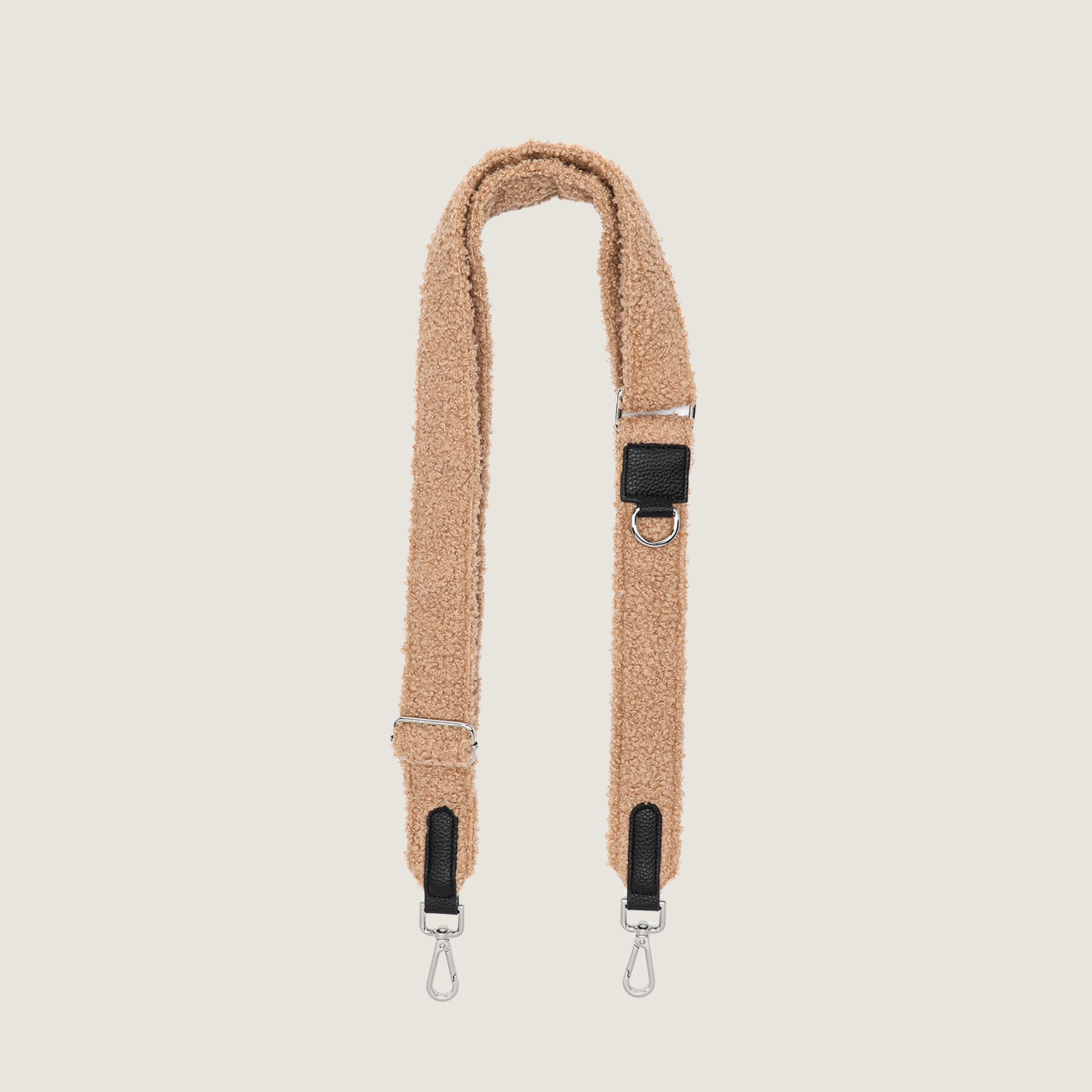 Een prachtige bruine teddy stof strap voor de dogmom bag