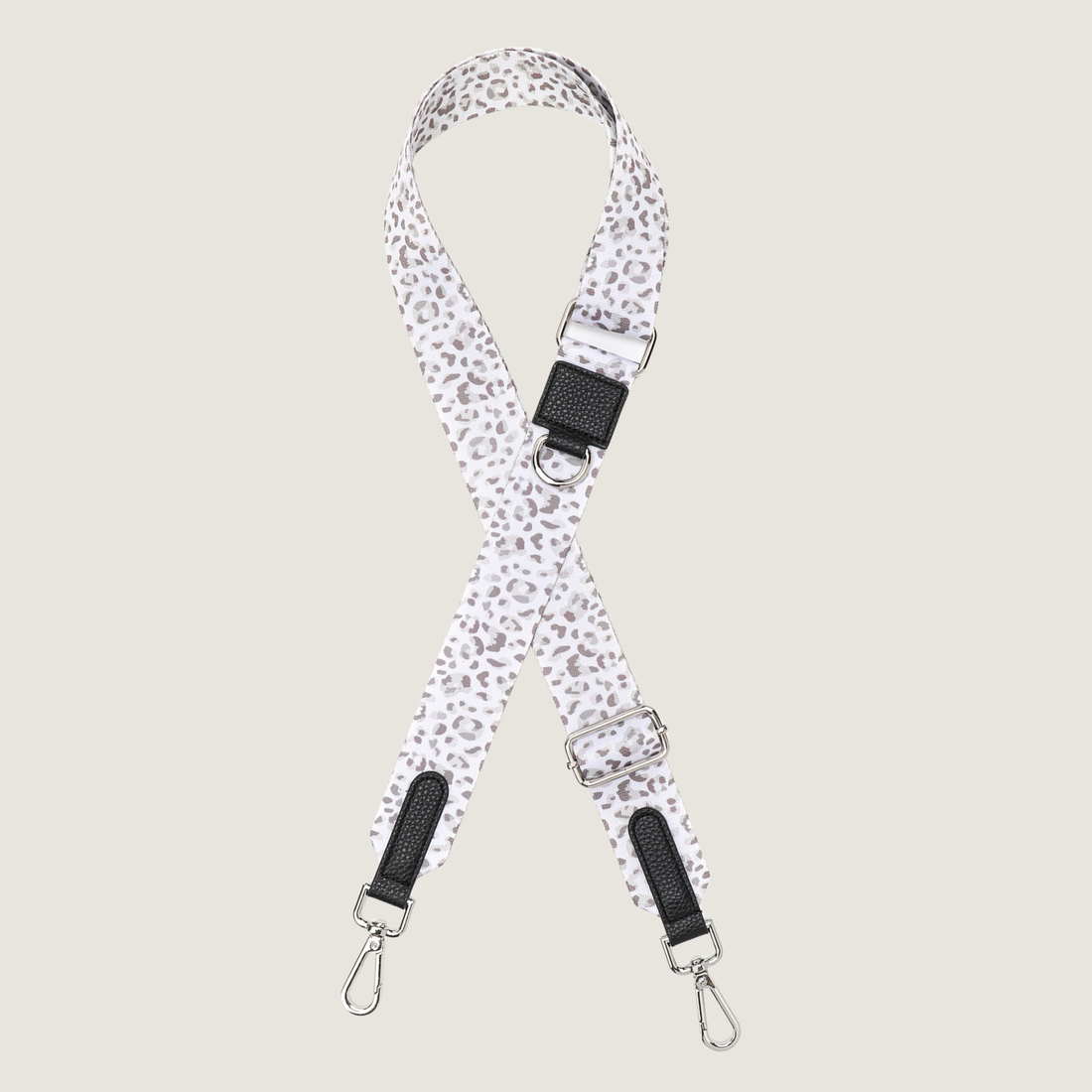 Witte strap met beige en taupe kleur leopard print met zilver hardware van de Snowy Leopard collectie van Jaap & Co