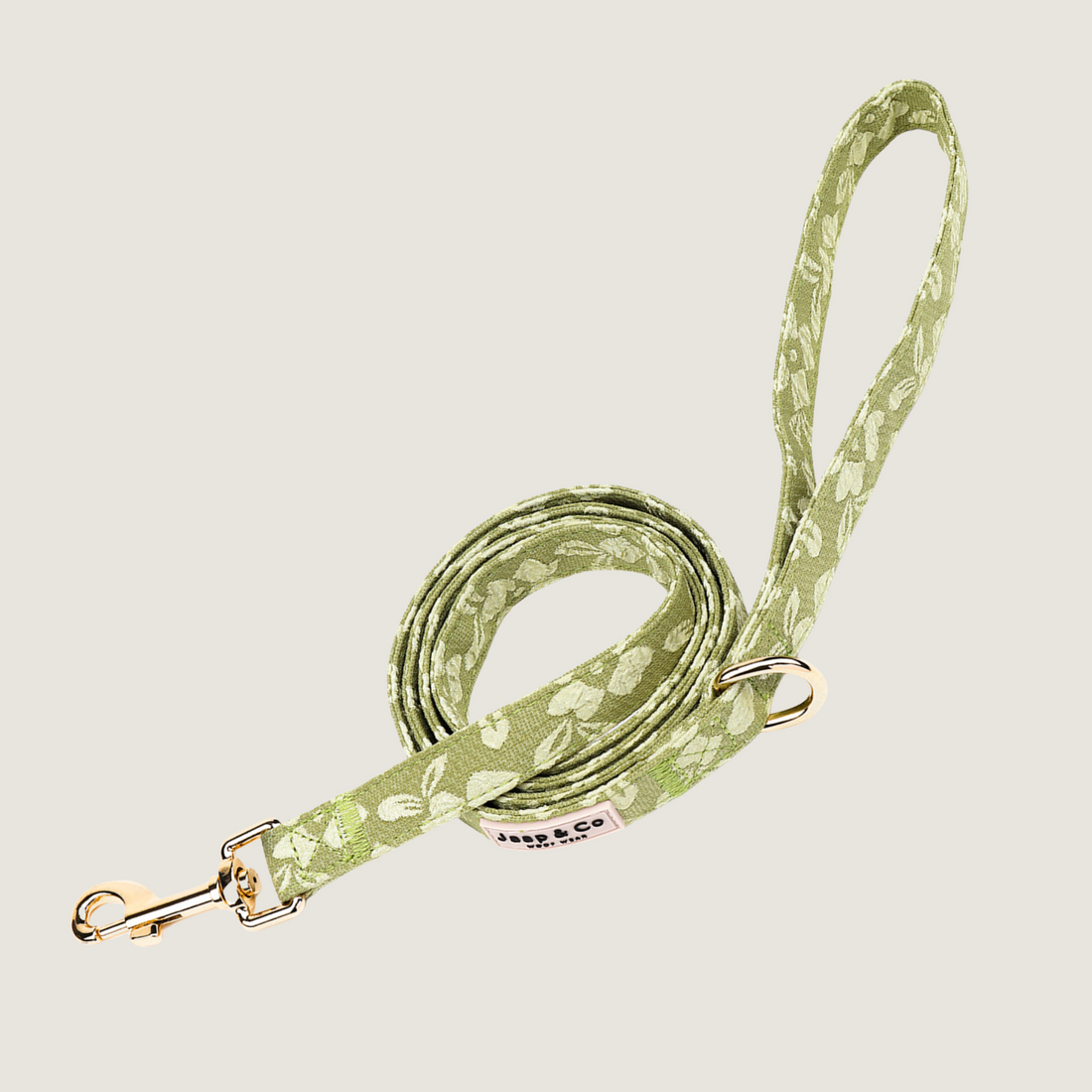 Lichtgroene hondenriem met geborduurde bloemenprint van de Botanical Glow Jaap & Co collectie