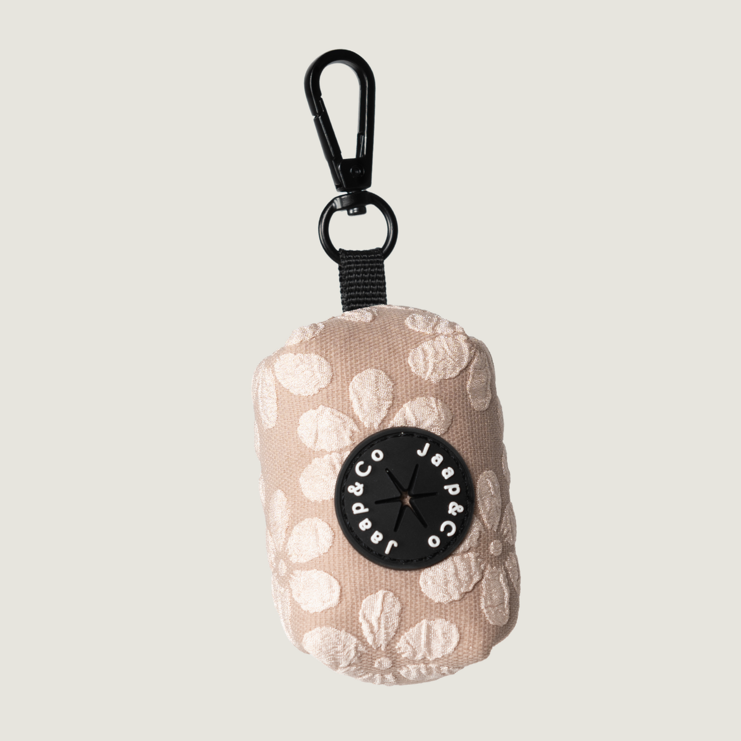 Beige poepzakjeshouder met bloemenprint uit de Blush Elegance collectie van Jaap &amp; Co – handig en stijlvol voor onderweg.