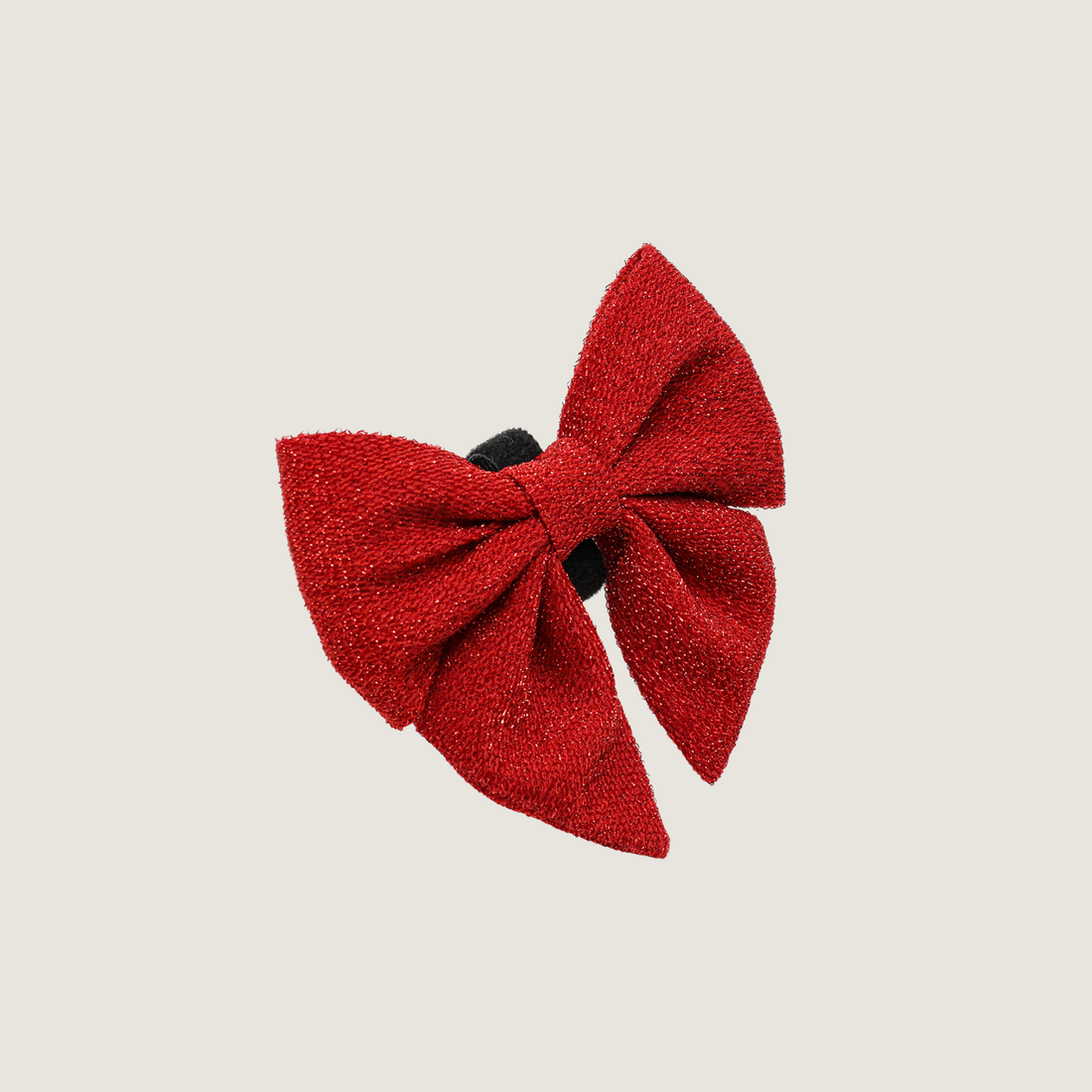 Een rode glitter strik met klittenband om op een halsband te bevestigen. 