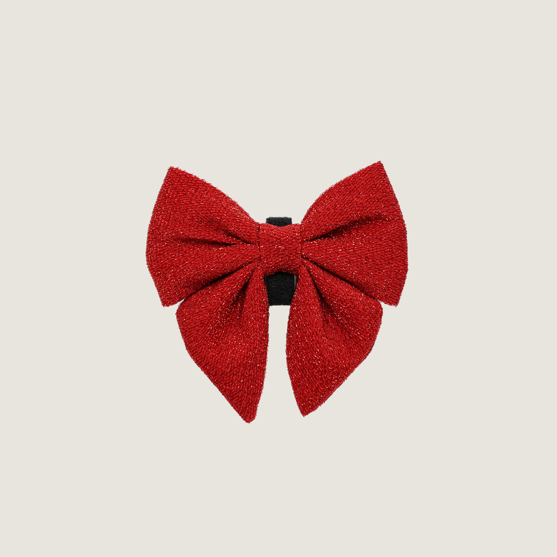 Een rode glitter strik met klittenband om op een halsband te bevestigen. 