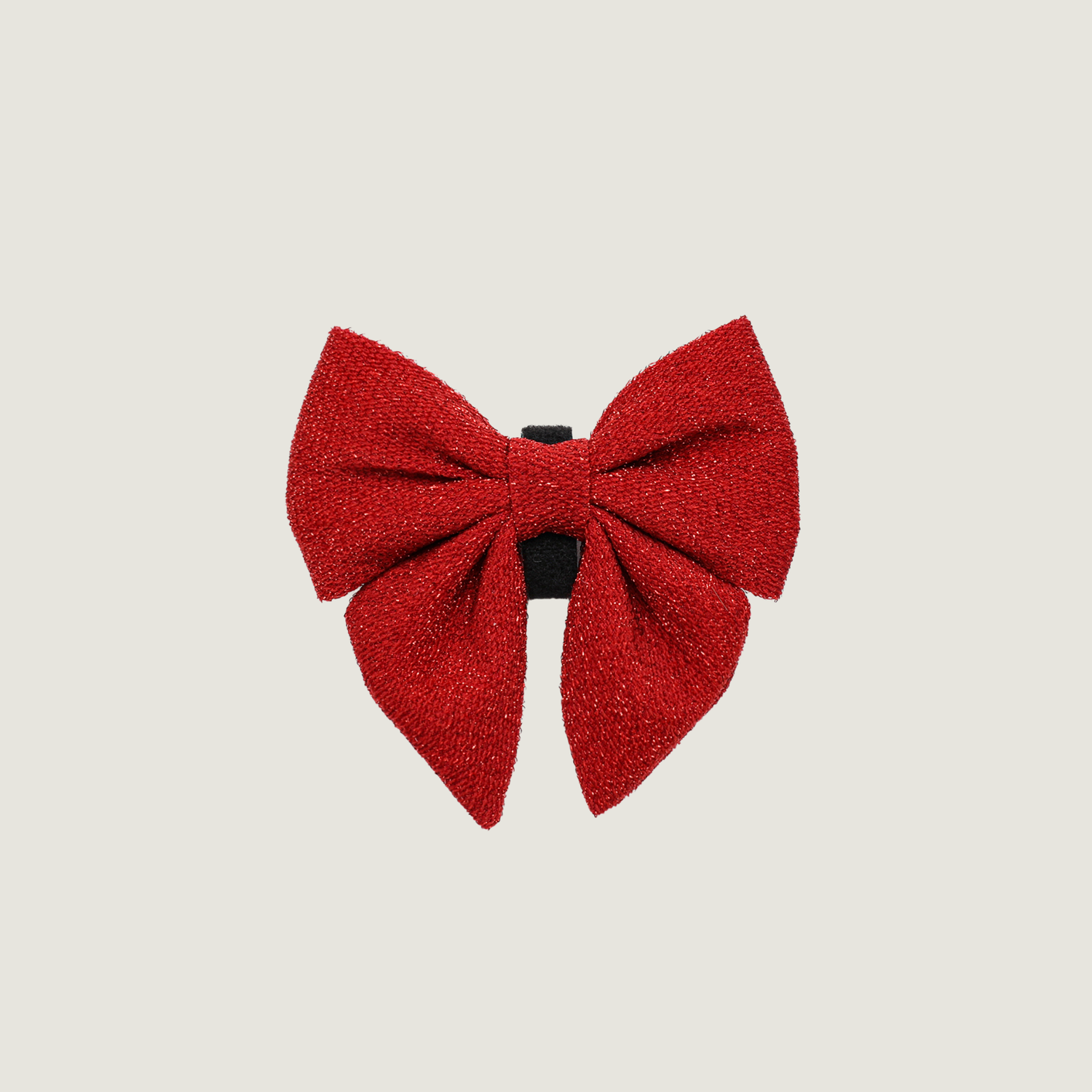 Een rode glitter strik met klittenband om op een halsband te bevestigen. 