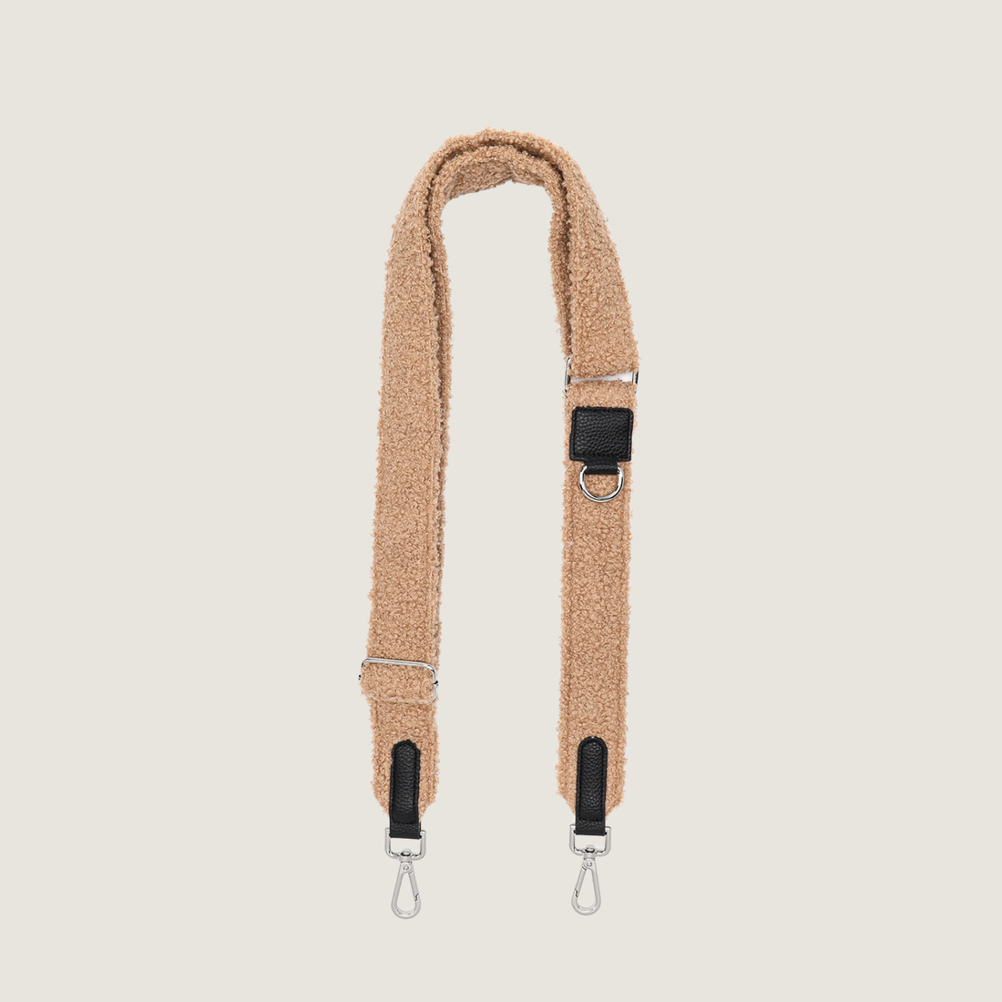 Een prachtige bruine teddy stof strap voor de dogmom bag