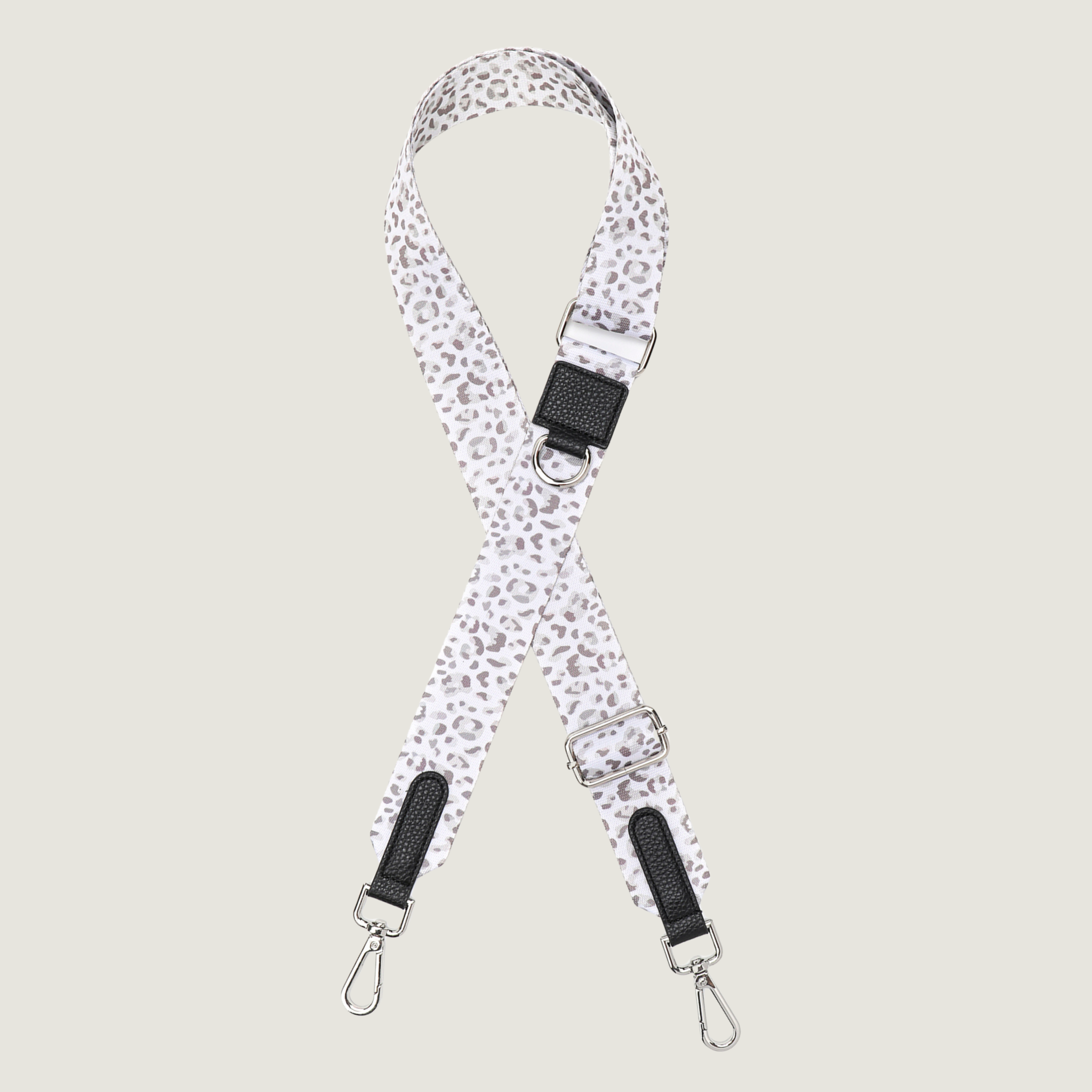 Witte strap met beige en taupe kleur leopard print met zilver hardware van de Snowy Leopard collectie van Jaap &amp; Co
