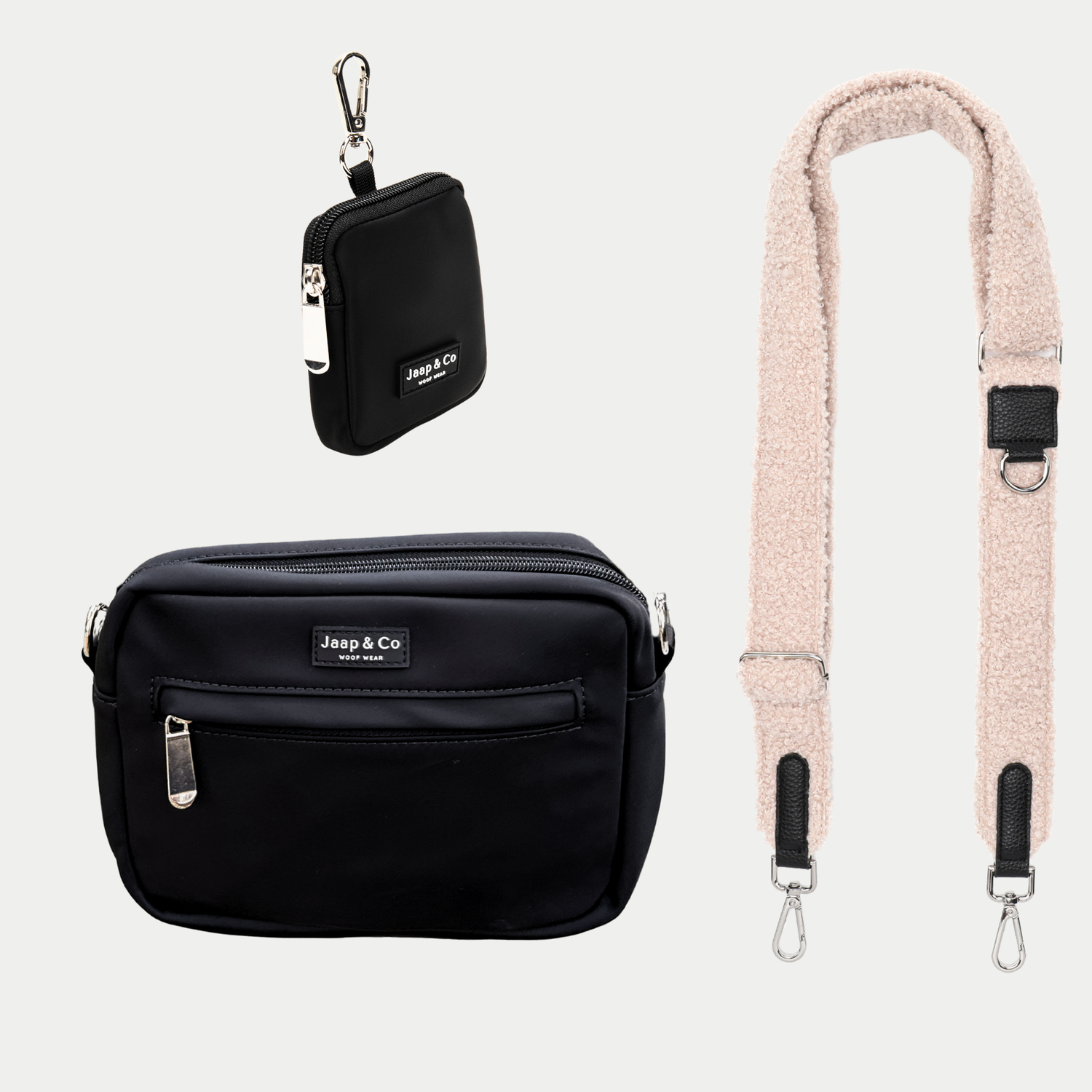 Zwarte dogmom bag met treatpouch met de verwisselbare strap in een beige teddy stof
